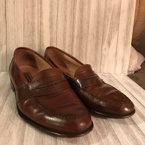Mens Florsheim shoes made in Italy and size 9 1/2 E. Nice brown color.